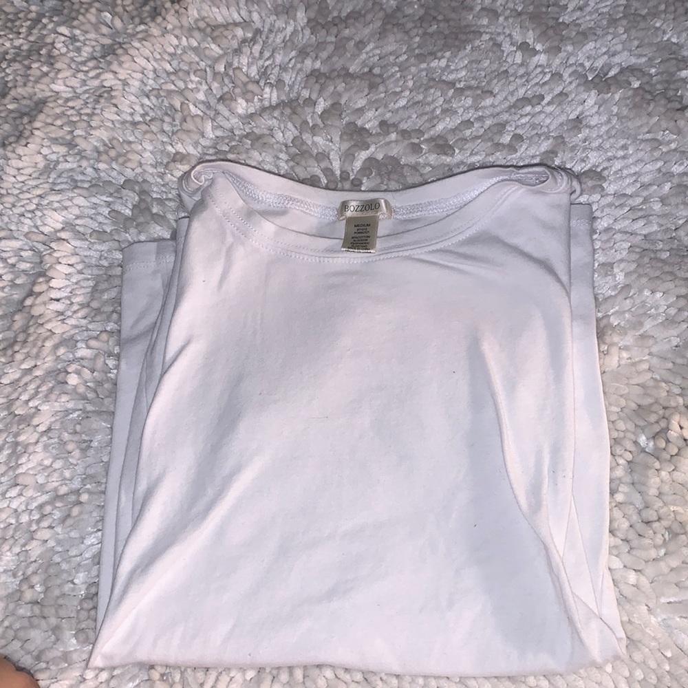 Plain white M sized T shirt . Too small to wear